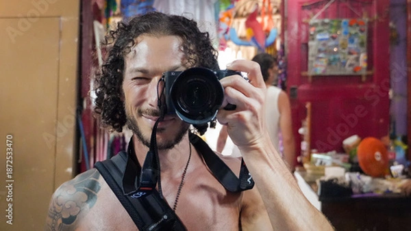 Obraz young man with camera