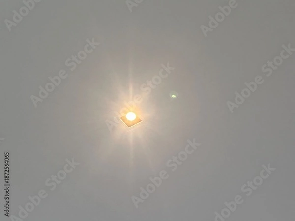 Obraz sun shining through the clouds