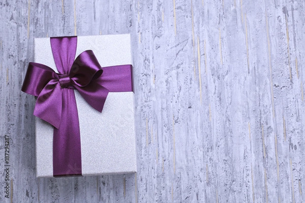 Obraz Concrete background with gift boxes, top view - studio shot