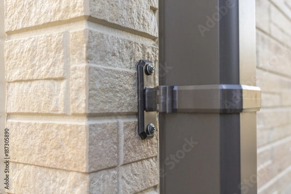 Fototapeta 雨どいの固定