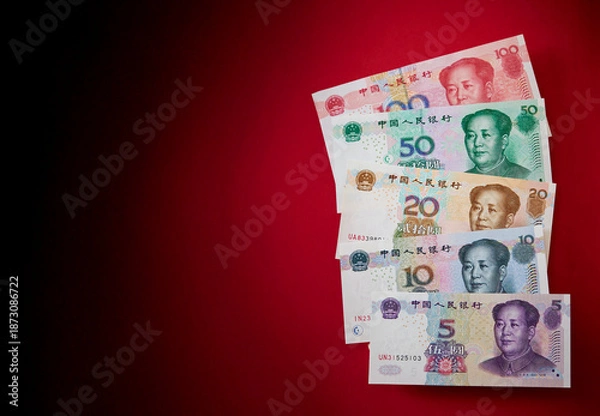 Obraz Chinese banknotes on a red background