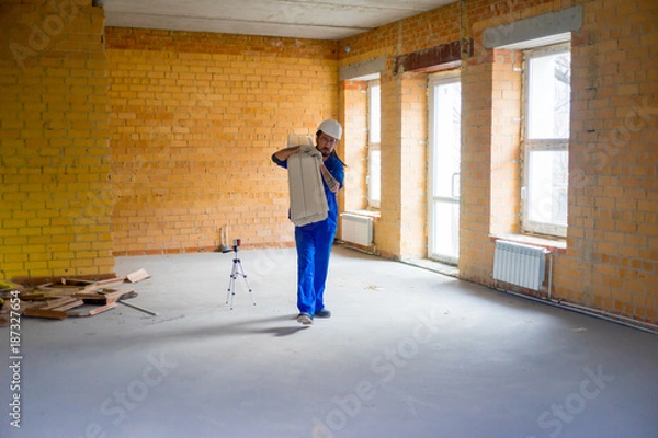 Fototapeta Worker on a consruction site