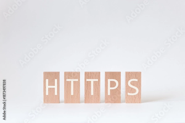 Obraz There is wood block with the word HTTPS. It is an abbreviation for Hypertext Transfer Protocol Secure as eye-catching image.