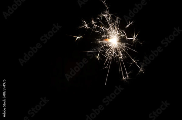 Fototapeta Close Up of a Sparkler with Black Background