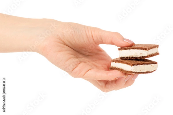 Fototapeta Chocolate cake candy biscuit milk in hand