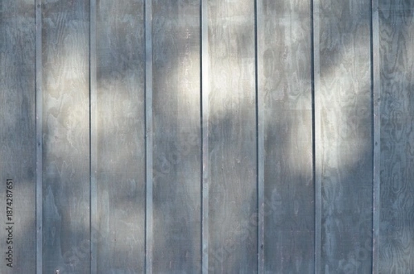 Fototapeta texture gray vertical siding wall with shadows background