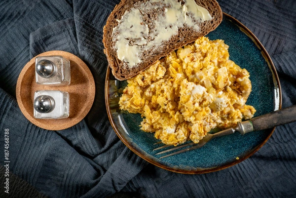Obraz Scrambled eggs with onion.