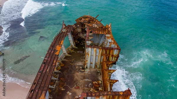 Obraz Rusted Shipwreck on Sandy Beach