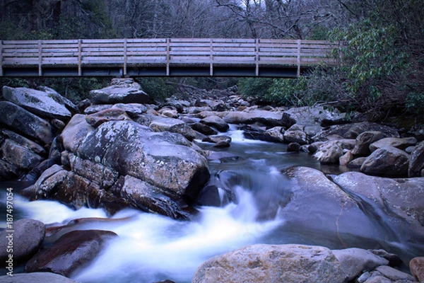 Obraz Wooden Bridge over a Fairytale Like Fantasy River Stream in the Magical Forest