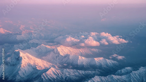 Obraz sunset over peaks in a high mountain range