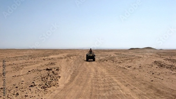 Obraz Quad biking on a desert