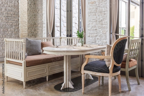 Fototapeta Table set on wood dinning table at home Modern dinning room