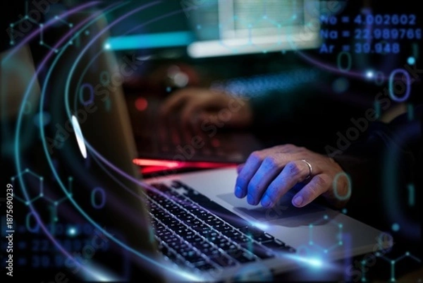 Obraz Man working on laptop in dark