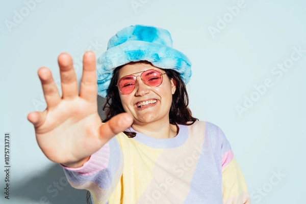 Obraz Plus size woman model posing in studio and having fun.