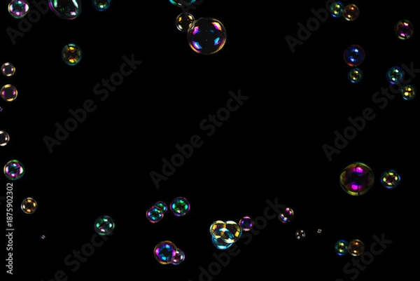 Obraz Soap bubbles isolated on a black background