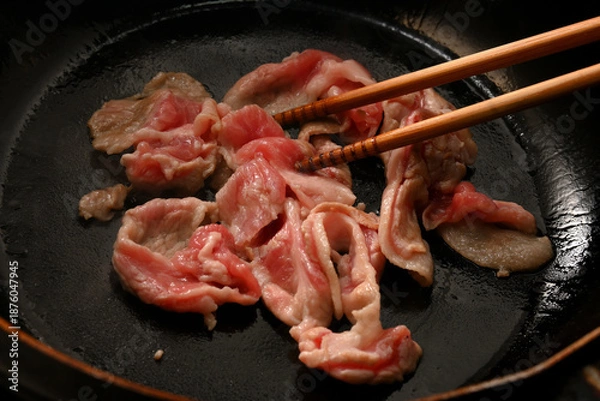 Obraz 豚肉を炒めている様子