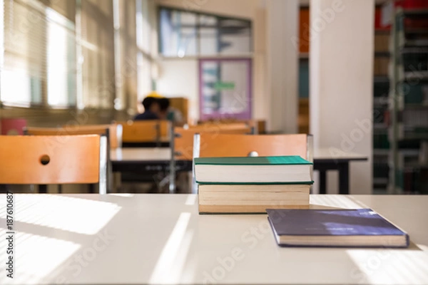 Obraz textbooks on table in library