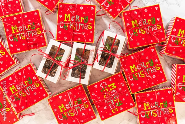 Obraz Christmas Cookie Gift Boxes with Festive Wrapping