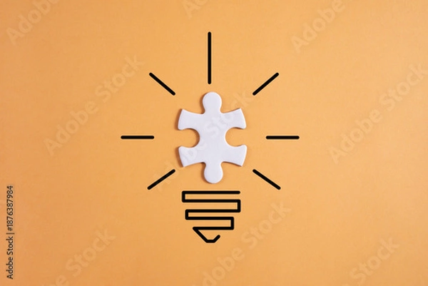 Obraz creative light bulb with puzzle pieces