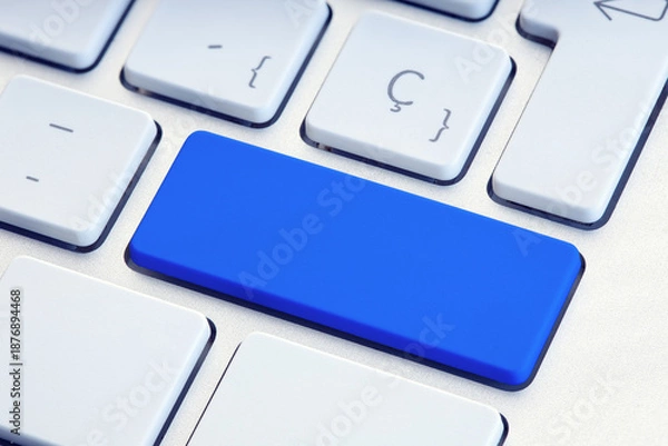 Obraz Blue blank key on white computer keyboard mockup