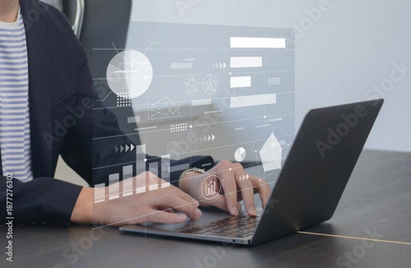 Obraz ノートパソコンでデータ分析の作業を行うビジネスパーソン　データサイエンスやマーケティング分析のビジネスイメージ