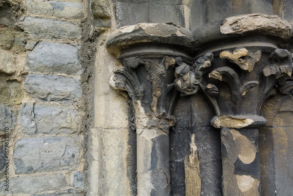 Obraz Old stone wall and carving