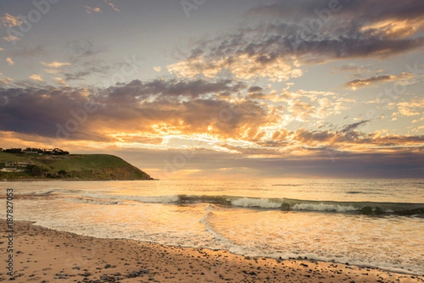 Obraz Colourful sunset at the beach with pebbles in Myponga Beach South Australia