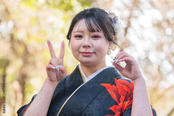 Obraz 神社でお参りする着物姿の女性