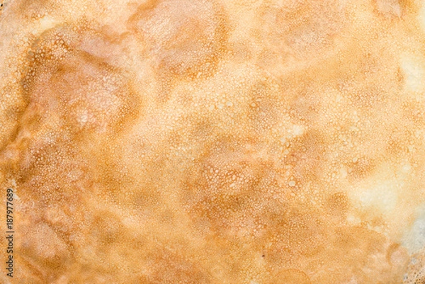 Fototapeta Close up texture of a pancake surface.