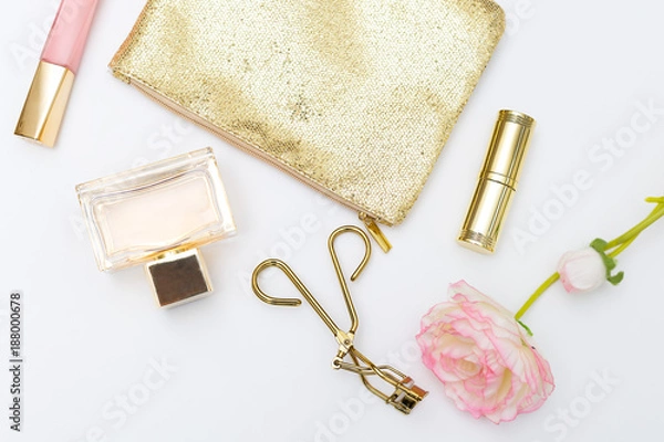 Obraz Cosmetics and accessories pink&gold on a white background. Lifestyle flat lay