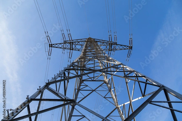 Obraz High-voltage pylon with cables for power supply.