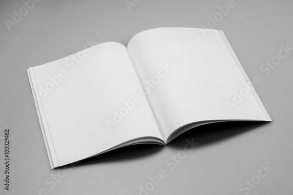 Obraz Mock-up magazine, book or catalog on gray table. Blank page or notepad on solid background. Blank page or notepad for mockups or simulations.