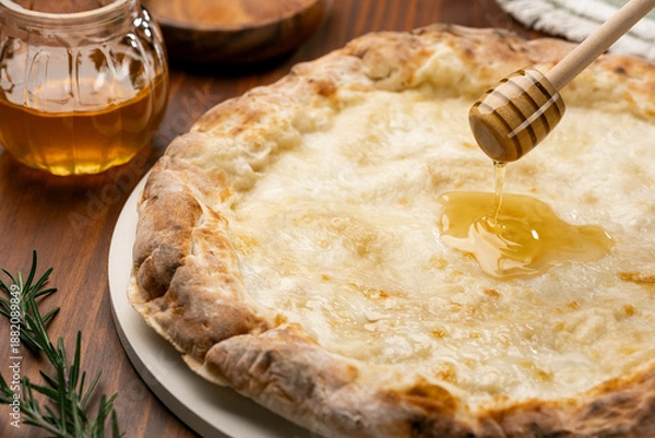 Obraz はちみつが広がるクワトロフォルマッジの温かみある風景