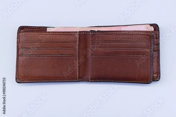 Fototapeta A wallet with a certain amount of money