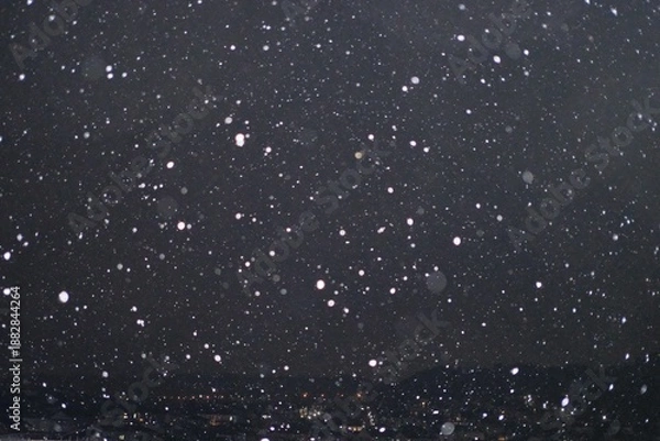 Obraz snow falling in the sky