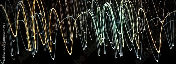 Obraz Abstract linear composition. Photography, selective focus, long exposure, dynamic movement. Light lines. Texture. Background. Cover. Wrapper.