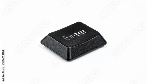 Obraz Single black “Enter” keyboard key slightly tilted on white background, emphasizing digital input and simplicity.