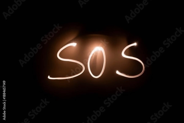 Obraz Text SOS, made with light.