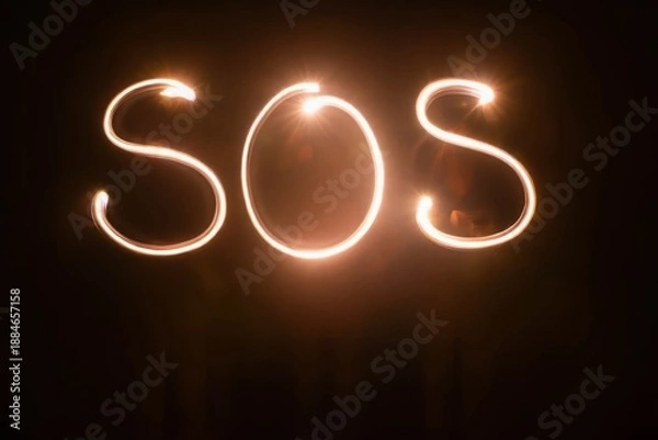 Obraz Text SOS, made with light.