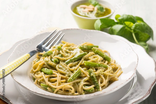 Obraz spaghetti with green beans and pesto sauce, selective focus