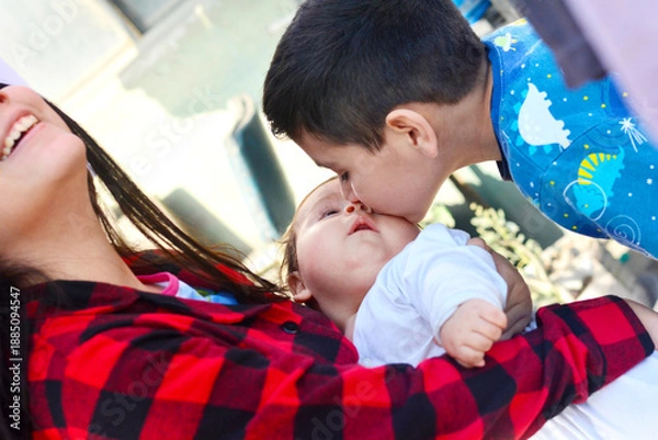 Obraz Three latin siblings with big age difference.