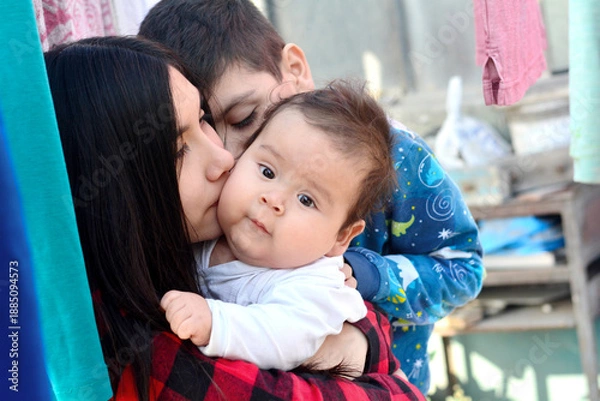 Obraz Three latin siblings with big age difference.