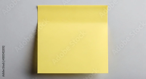 Obraz A yellow envelope on a gray background