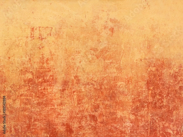 Obraz Old orange wall with red spots from below
