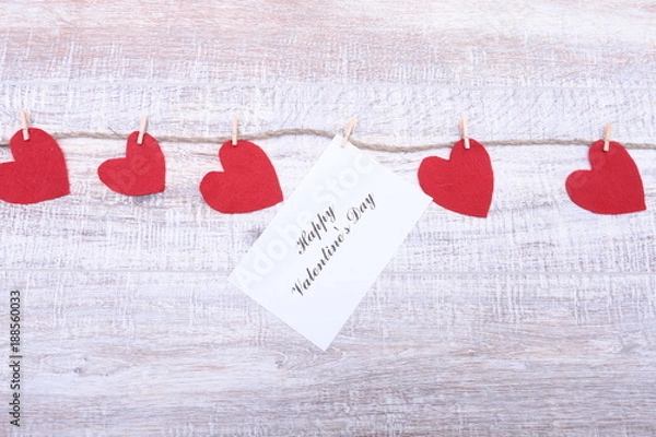 Fototapeta Red hearts on wooden background.Valentines day greeting card.Top view with copy space