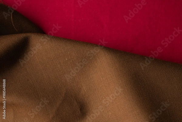 Obraz Warm brown cloth with red fabric creating elegant contrast