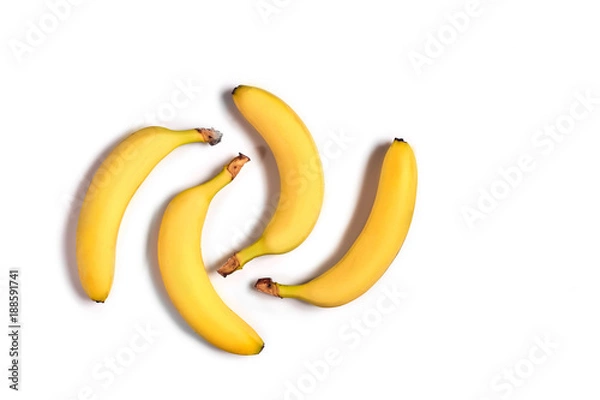 Fototapeta Ripe yellow bananas on a white background