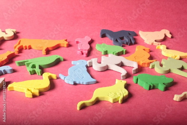 Obraz animals toys on a red background