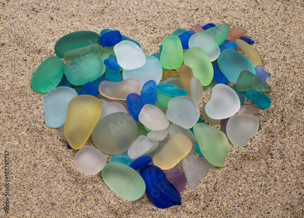 Fototapeta Colorful seaglass arranged in the shape of a heart