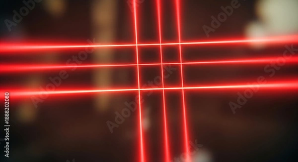 Obraz Red laser beams intersecting in a dark room
